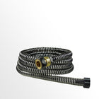 Coiled garden hose with brass fitting on a white background