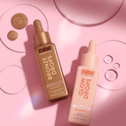 Two skincare droppers, one labeled 'Bronze Drops' and the other 'Glow Drops', on a pink background.