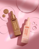 Two skincare droppers, one labeled 'Bronze Drops' and the other 'Glow Drops', on a pink background.