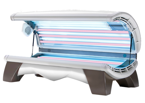 A commercial tanning bed with multiple high-output lamps arranged for even tanning coverage, featuring a mix of UV and red light lamps.