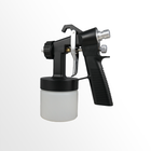 Black spray gun with a white container on a white background