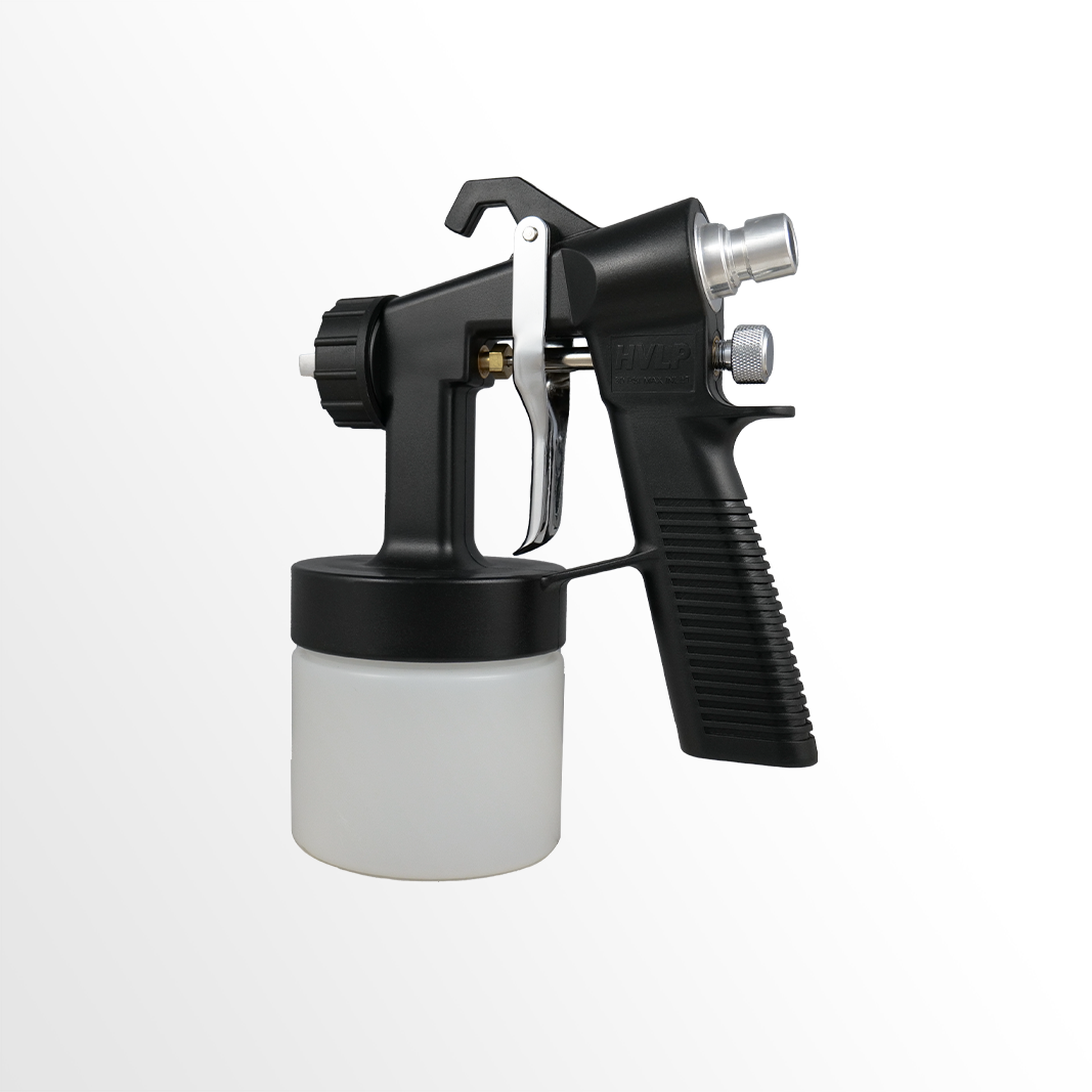 Black spray gun with a white container on a white background