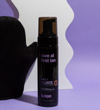 B.tan self-tanning product with a black pump on a purple background