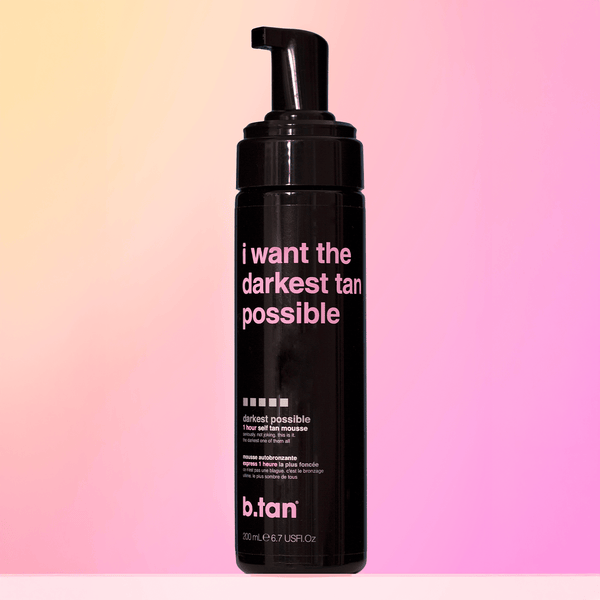 Black bottle of b.tan with pink text on a gradient background