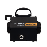 Black tanning machine with Fujispray and studioTAN branding on a white background